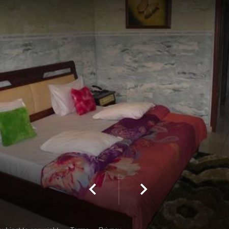 Nondon International Hotel Енугу Екстериор снимка